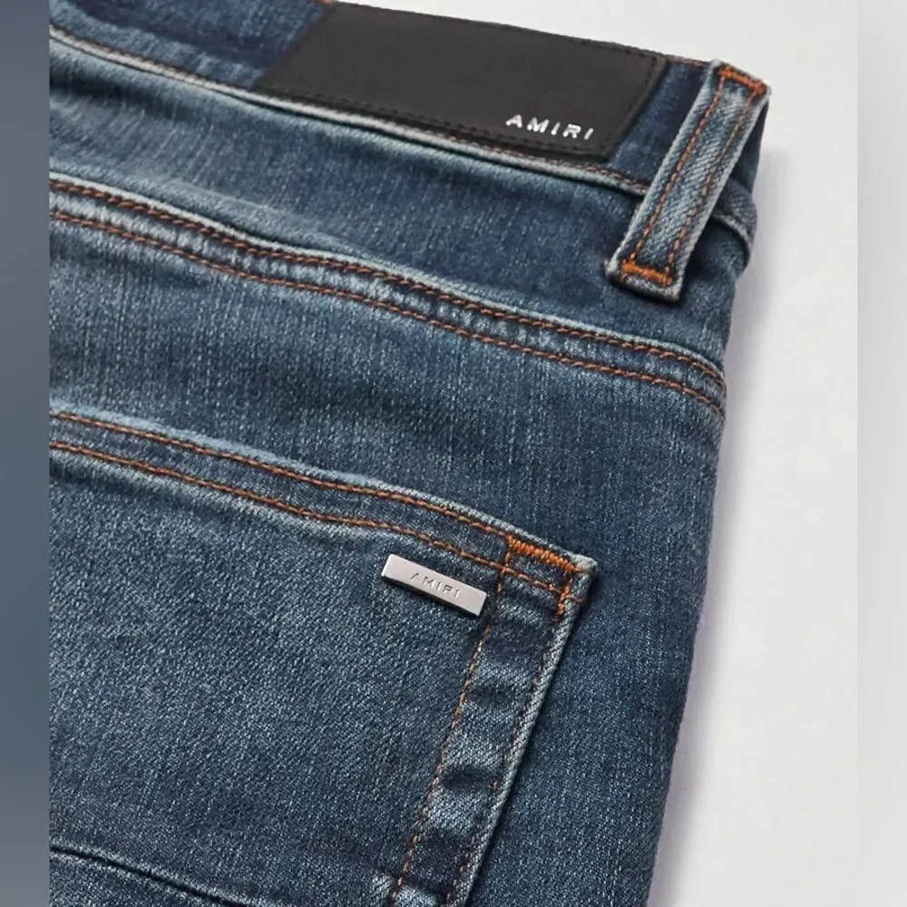AMIRI Skinny-Fit Leather Appliquéd Distressed Jeans Blue/Black 32 NWT